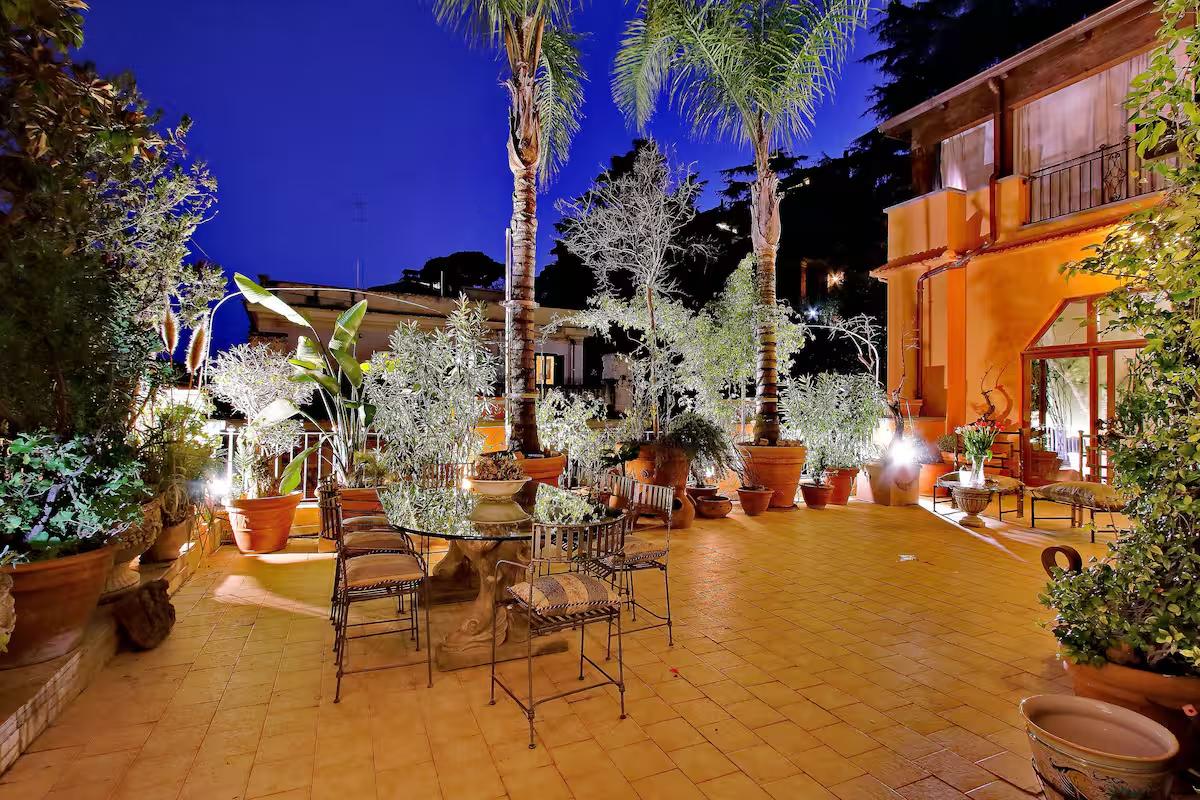 Nighttime view of the private terrace at Luxury Trastevere Terraces