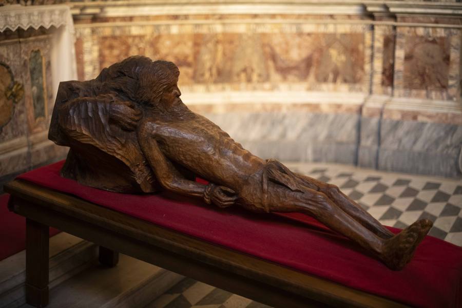 Close view of the Christ sculpture and supporting figure